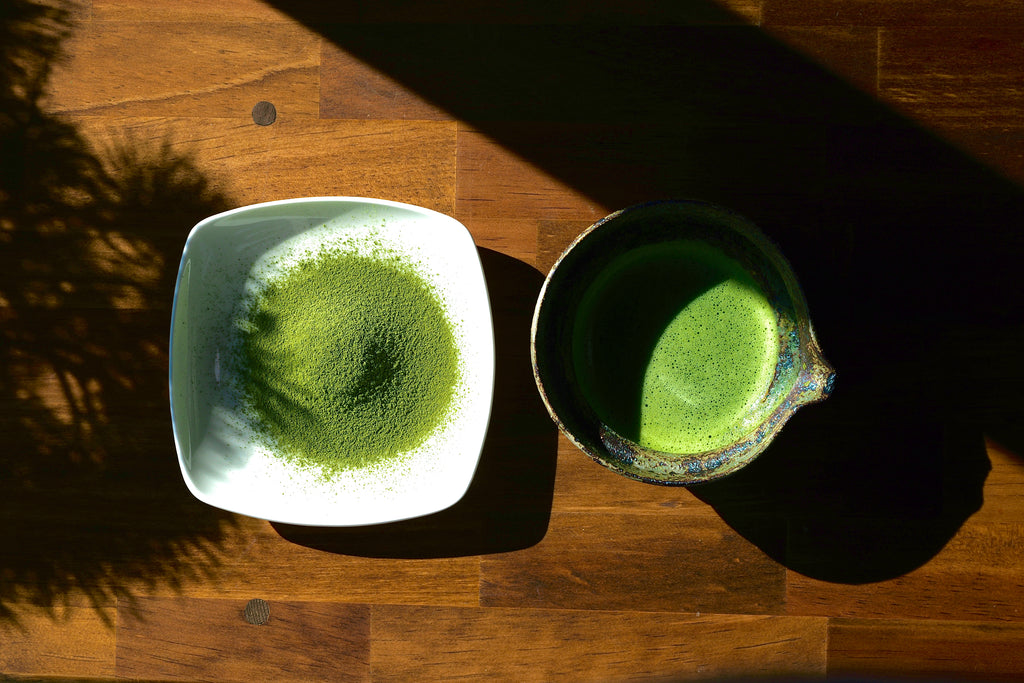 A bowl of freshly whisked Matcha Sei-Jaku with a rich, creamy foam, showcasing its smooth texture.