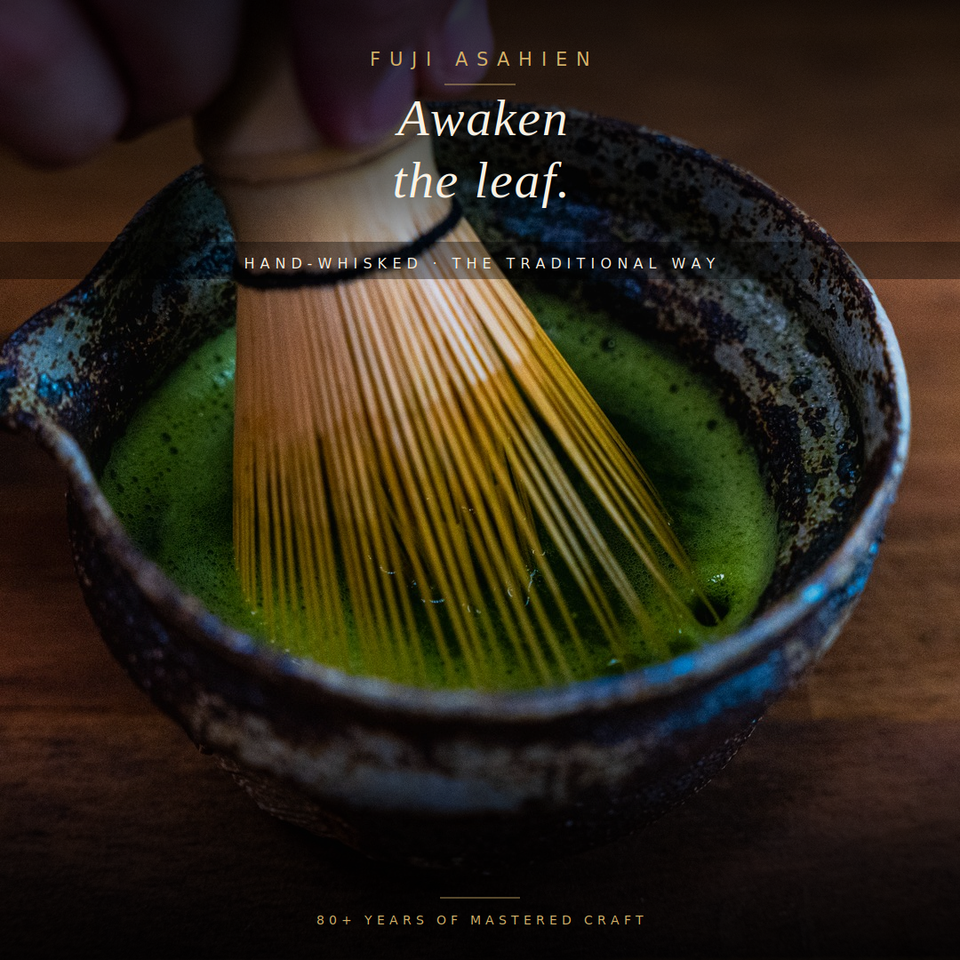 Matcha Sei-Jaku being whisked in a ceramic bowl with a traditional bamboo chasen, forming a thick, velvety green foam
